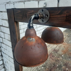 Rusty wall lamp in industrial style. Wall sconce.
