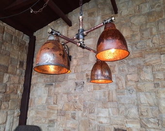 Rusty industrial style ceiling chandelier. Hanging lamp, rustic hanging chandelier for country house.