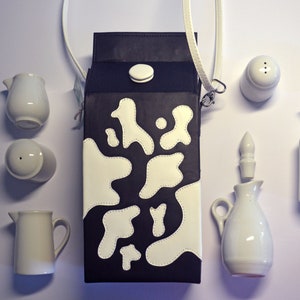 Melk crossbody tas
