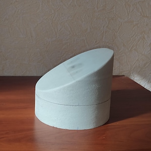 Hat block asymmetrical. Avant-garde hat block.
