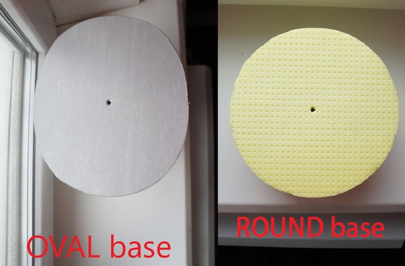 May include: Two round cake bases, one white and one yellow with a textured surface. The white base is labelled "OVAL base" and the yellow base is labelled "ROUND base".