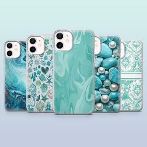 May include: Five different iPhone cases with various designs. The cases are clear and show a variety of patterns, including marble, seashells, and turquoise stones.
