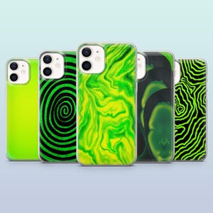 May include: A collection of five phone cases with vibrant designs. The cases feature a range of patterns, including a solid neon green, a black and green spiral, a swirling green and yellow pattern, a dark green design, and a black and green topographic pattern.