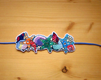 Embroidered bracelet "Asteroidea"
