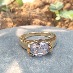 Vit safir guldfylld ring: Ovalslipad sterlingsilverring