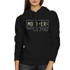 May include: Black hooded sweatshirt with a white graphic that reads "MOTHER: (Noun):  C in therapist and b st friend"