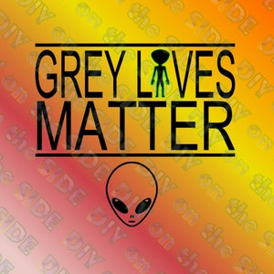 May include: Black and white graphic design with the text "GREY LIVES MATTER" in all caps. A green alien figure is centered above the text. The background is a gradient of orange, yellow, and red.
