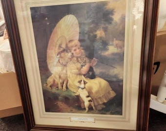 Bellissimo disegno incorniciato, realizzato con matite colorate, raffigurante una bambina.