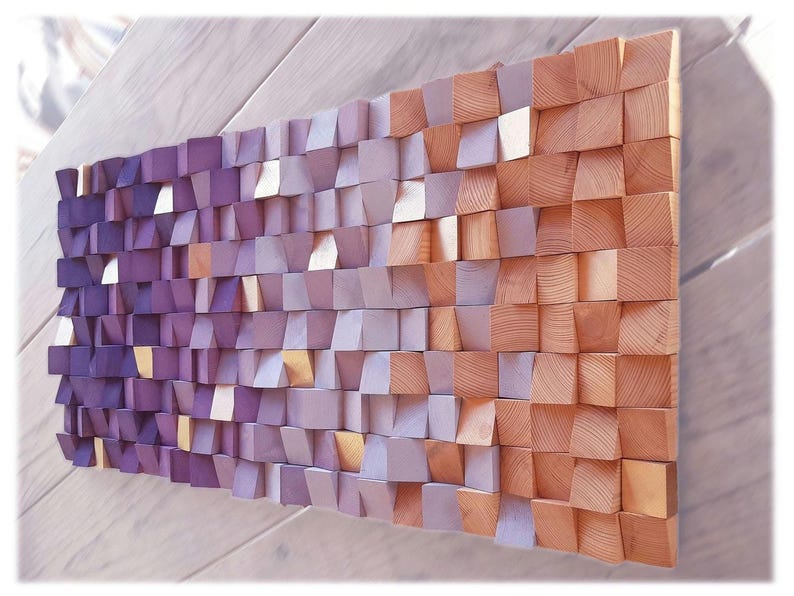 a wooden texture composed of small square tiles in various shades of purple and orange, arranged in a grid-like pattern.