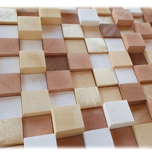 May include: A wall made of various sized wooden blocks in shades of brown, beige, and white. The blocks are arranged in a staggered pattern, creating a textured and visually interesting surface.
