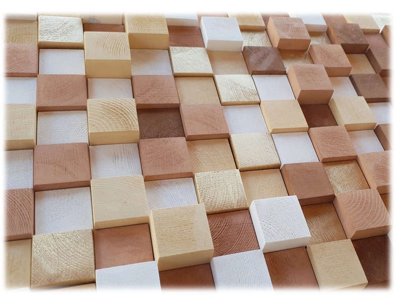 May include: A wall made of various sized wooden blocks in shades of brown, beige, and white. The blocks are arranged in a staggered pattern, creating a textured and visually interesting surface.