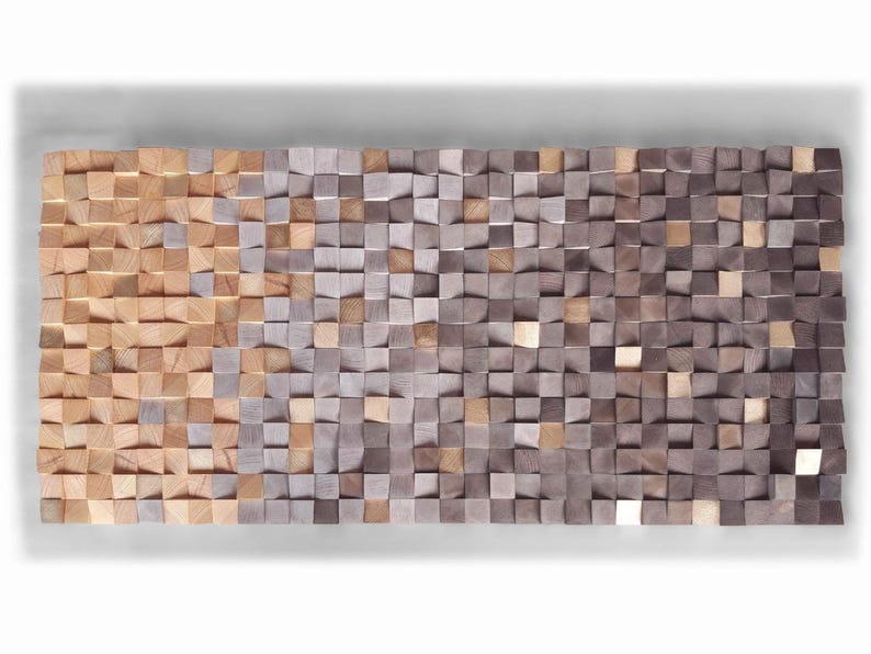 a large, rectangular, and textured surface composed of numerous small, square-shaped wooden blocks in various shades of brown and gray. The blocks are arranged in a grid-like pattern, creating a visually striking and intricate design.