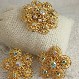 Vintage 1960s Pierced Metal and Aurora Borealis Rhinestone Brooch and Statement Clip-On Earrings