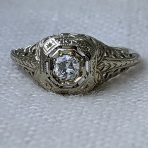 Antique 1920s Early Art Deco 18k White Gold Filigree Engagement Ring with .20ct Old European Cut Diamond