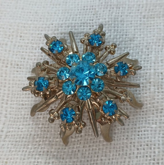 1950s Teal Rhinestone Starburst Brooch