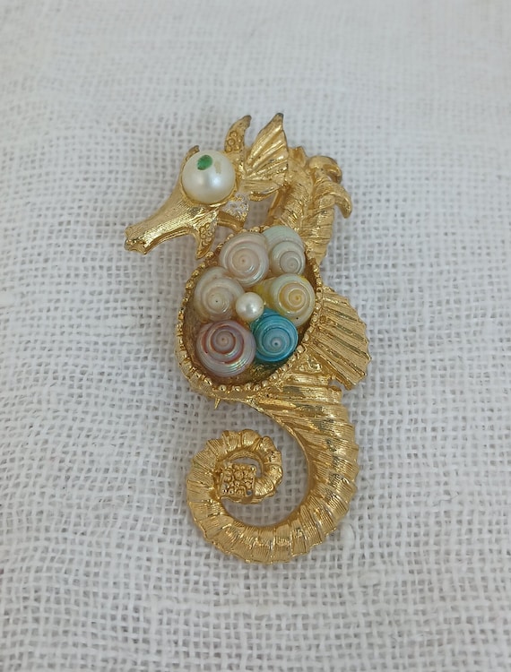 Vintage Seahorse Brooch with Trochus Shell Center - image 1