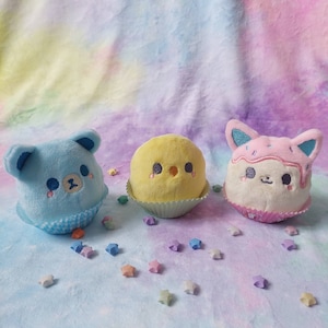 Mini cupcake plushie bear, chick, cat with strawberry icing