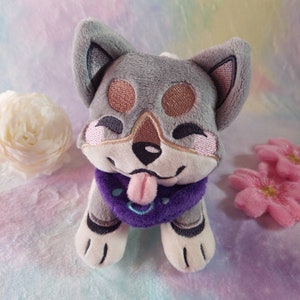 Plush toy Shiba Inu dog with purple bandana
