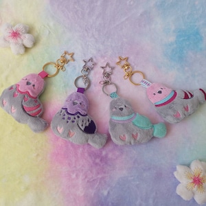 Cute dove keychains in various colors