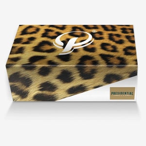 May include: A shoebox with a leopard print design. The box has a white label with the text "PRESIDENTIAL WEAR" on it.