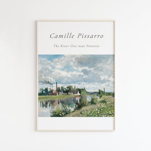 May include: A framed print of a painting by Camille Pissarro titled "The River Oise near Pontoise". The painting depicts a river scene with a factory in the background, a boat on the water, and lush greenery along the riverbank.