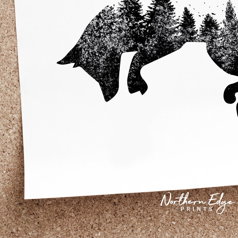 May include: Black and white art print featuring a silhouette of a bear with a forest scene inside. The print has a textured, distressed look. The words "Northern Edge Prints" are in the bottom right corner.