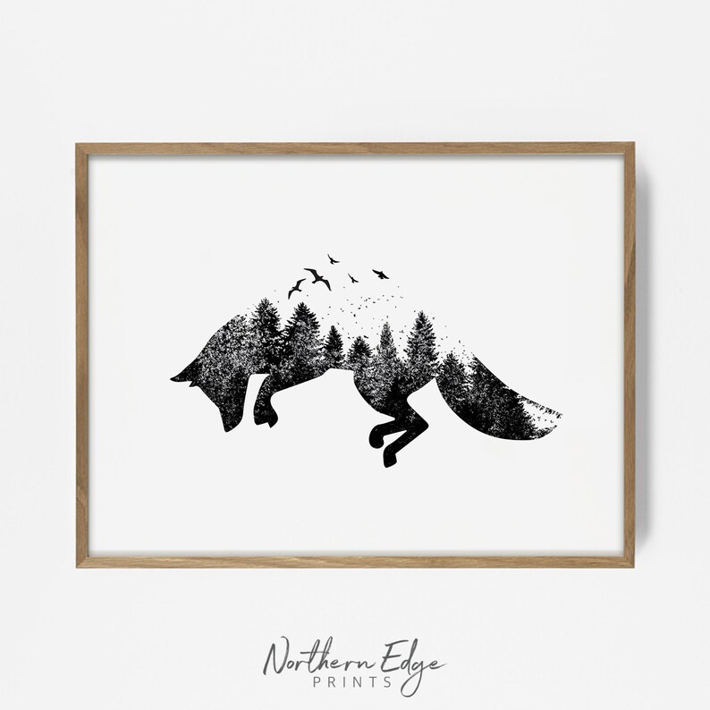 May include: A framed art print featuring a black silhouette of a fox with a forest and birds incorporated into its design. The artwork is set against a white background and framed in a light brown wooden frame. The text "Northern Edge Prints" is at the bottom.