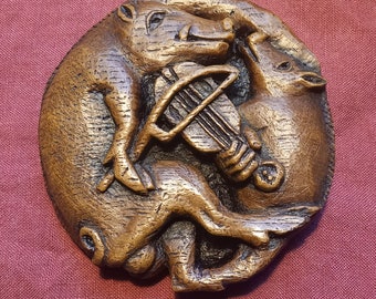 Boar Playing Viol carving