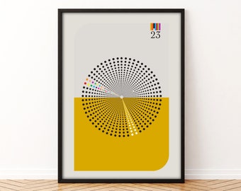 May include: A black and white geometric design with a yellow background. The design is a circle with a radiating pattern of dots. The number "23" is printed in the top right corner.