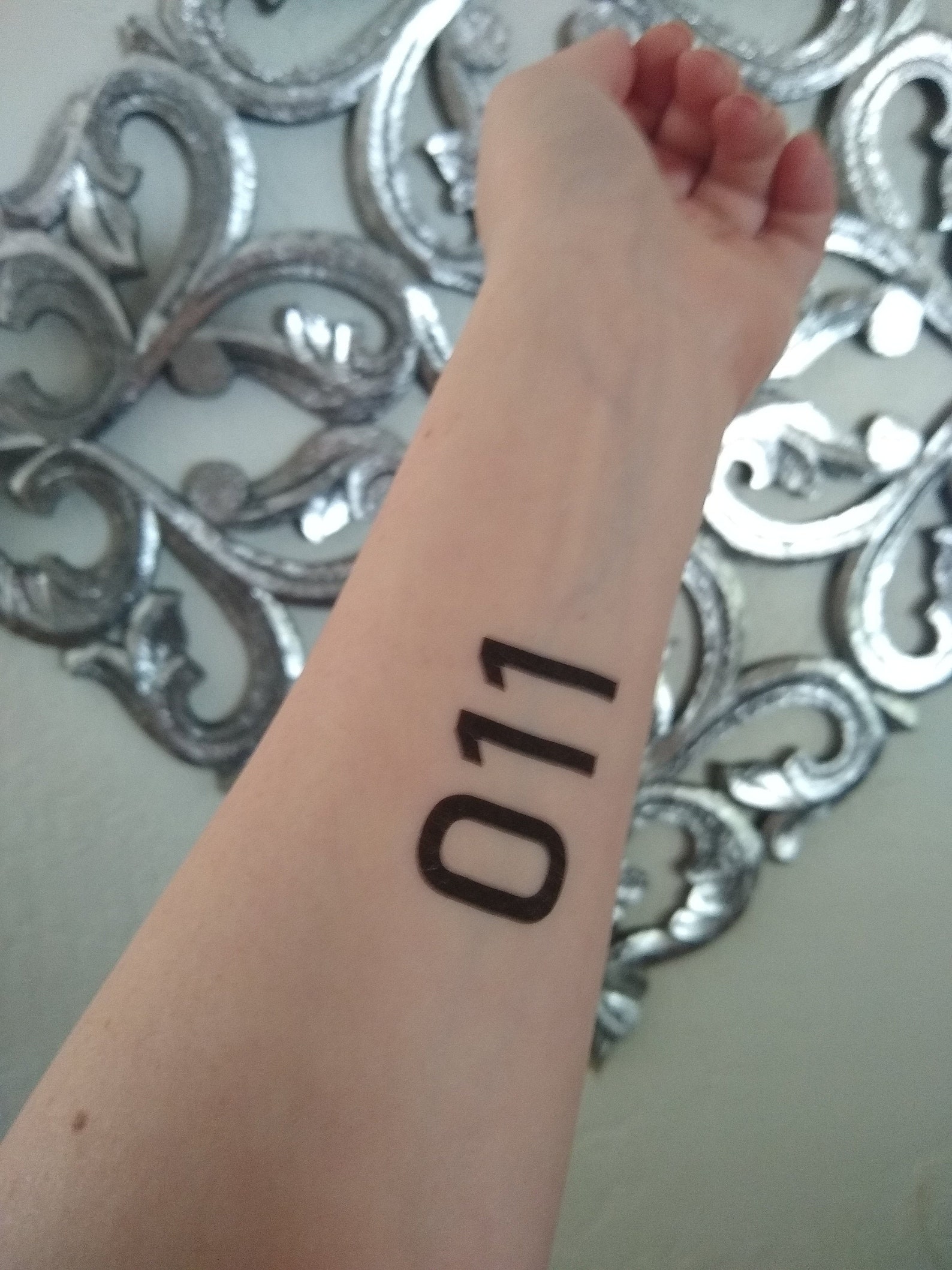 011 tattoo