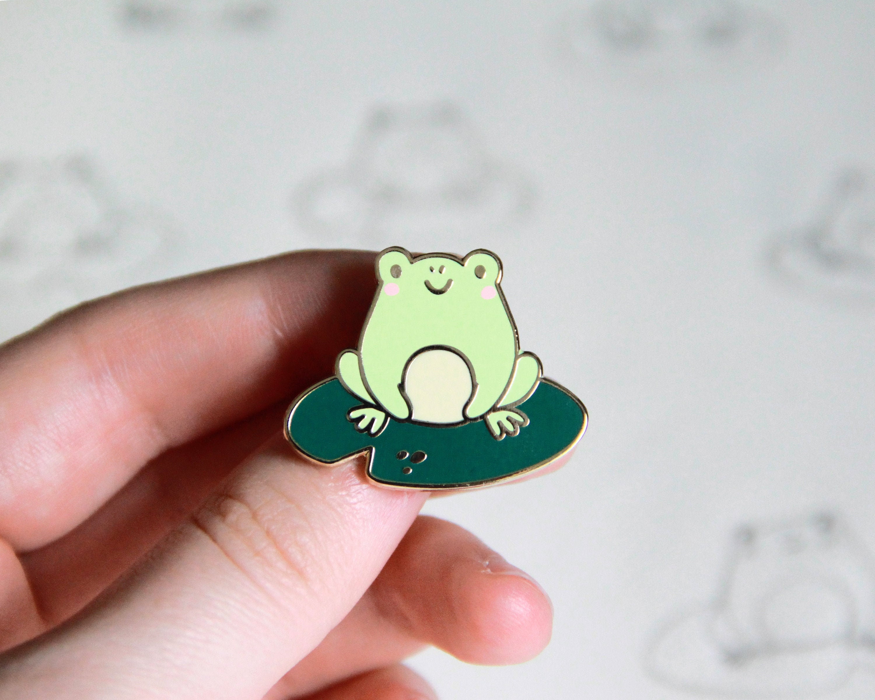 Moss: Onion and Other Unusual Frogs Enamel Pin