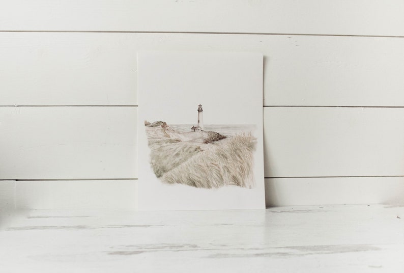 May include: A watercolor painting of a lighthouse on a grassy hill with the ocean in the background.