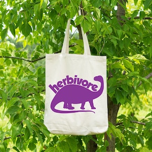 Herbivore Dinosaur Grocery Tote - Funny Dinosaur Vegetarian Canvas Tote Bag - Recycled Cotton Canvas Tote - Item 2762 - Purple Ink