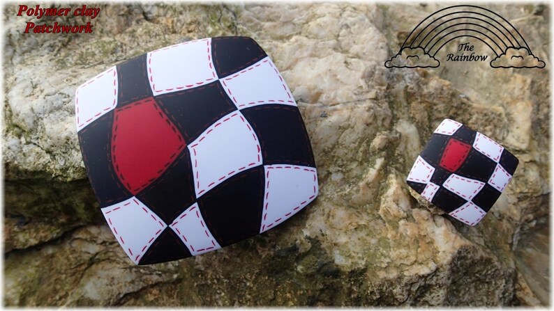 May include: Two polymer clay earrings with a black and white checkered pattern and red diamond accents. The earrings are shaped like squares and have a stitched design.