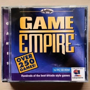 May include: A blue and yellow CD case with the title "GAME EMPIRE" and the text "Over 250 Games!"  Hundreds of the best arcade style games for PC CD-ROM.  The case also features the CompuServe logo.