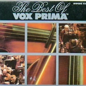 May include: A CD cover with a black background and the text "The Best Of VOX PRIMA" in white. The cover features a collage of images of a cello, a violin, and a group of musicians.