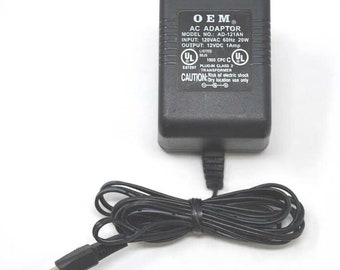 oem ac adapter model ad-121adt 12vdc 1a Brand New. These are one of the most useful power supplies ever made, Smart to have on hand