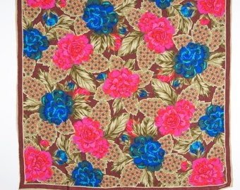 Albert Nippon scarf in silk jacquard floral. Browns, blues, fuchsias and reds. Exquisite style and color.