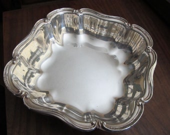 Silver plate serving dish by Canterbury, hallmarked and stamped, dining elegance and gracious living in shining silver service.