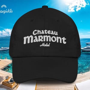 May include: Black baseball cap with white embroidered text that reads "Chateau Marmont Hotel".