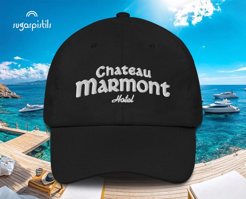 May include: Black baseball cap with white embroidered text that reads "Chateau Marmont Hotel".