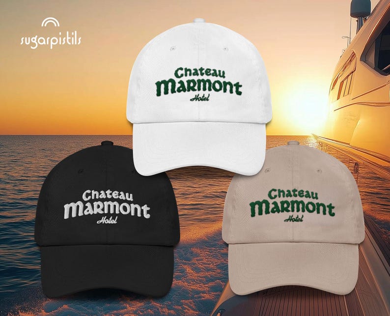 May include: Three baseball caps with the text "Chateau Marmont Hotel" embroidered in green on the front. The caps are white, black, and beige.