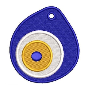May include: A blue and white evil eye charm with a gold center. The charm has a hole at the top for hanging.