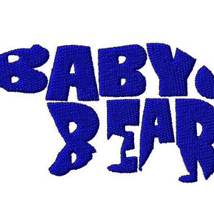 May include: Blue embroidered design of a bear with the words "BABY BEAR" inside the outline of the bear.