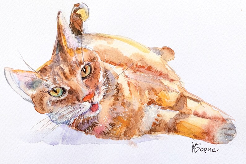 May include: Watercolor painting of a ginger cat lying on its back, looking towards the viewer. The cat has green eyes and a pink nose. The artwork is signed in the bottom right corner.