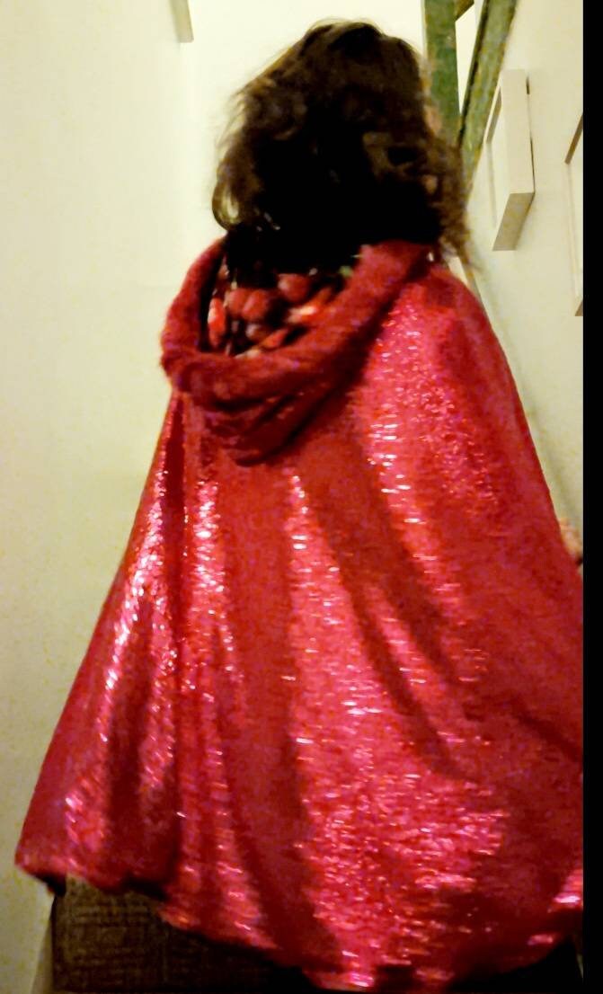red sequin cape