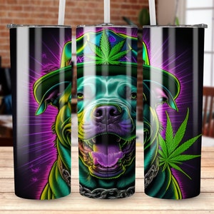 May include: A stainless steel tumbler featuring a colourful graphic of a pit bull wearing a hat and holding a marijuana leaf. The background is a purple and green gradient.