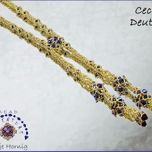 May include: Two gold beaded necklaces with purple and iridescent beads. The necklaces are twisted and have a decorative design. The text "Beadventure" and "Antje Hornig" is visible in the lower left corner. The text "Cecilia Deutsch" is visible in the upper right corner.