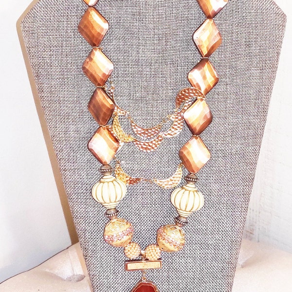 COPPER colored beaded necklace with gold moon shaped beads