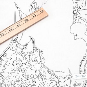 May include: A black and white line art map of a coastal area with a wooden ruler measuring 18 inches. The map is labeled "24 x 36" in the bottom right corner.